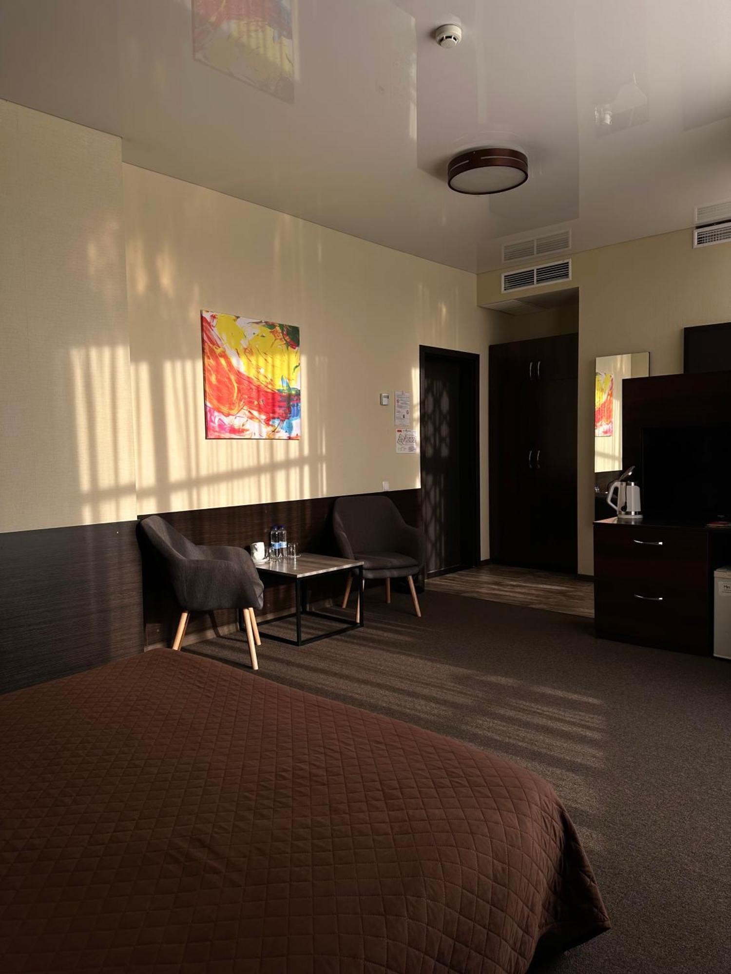 Hotel Atmosphere Полтава Стая снимка